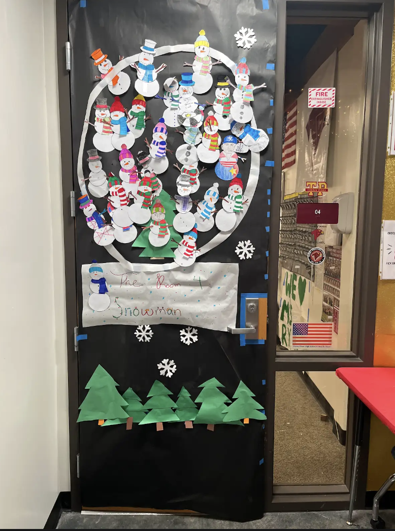 ASB adviser, Leadership and English 9 teacher Jennifer Ryan's classroom is decorated with colorful snow people. Trees and snowflakes were also included.